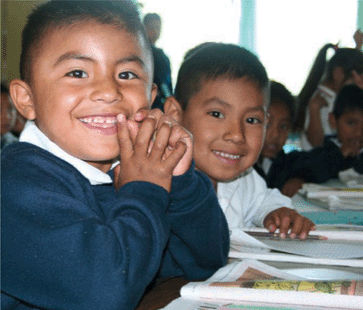 Offering incentives for children to stay in school (Photo: Science Magazine)